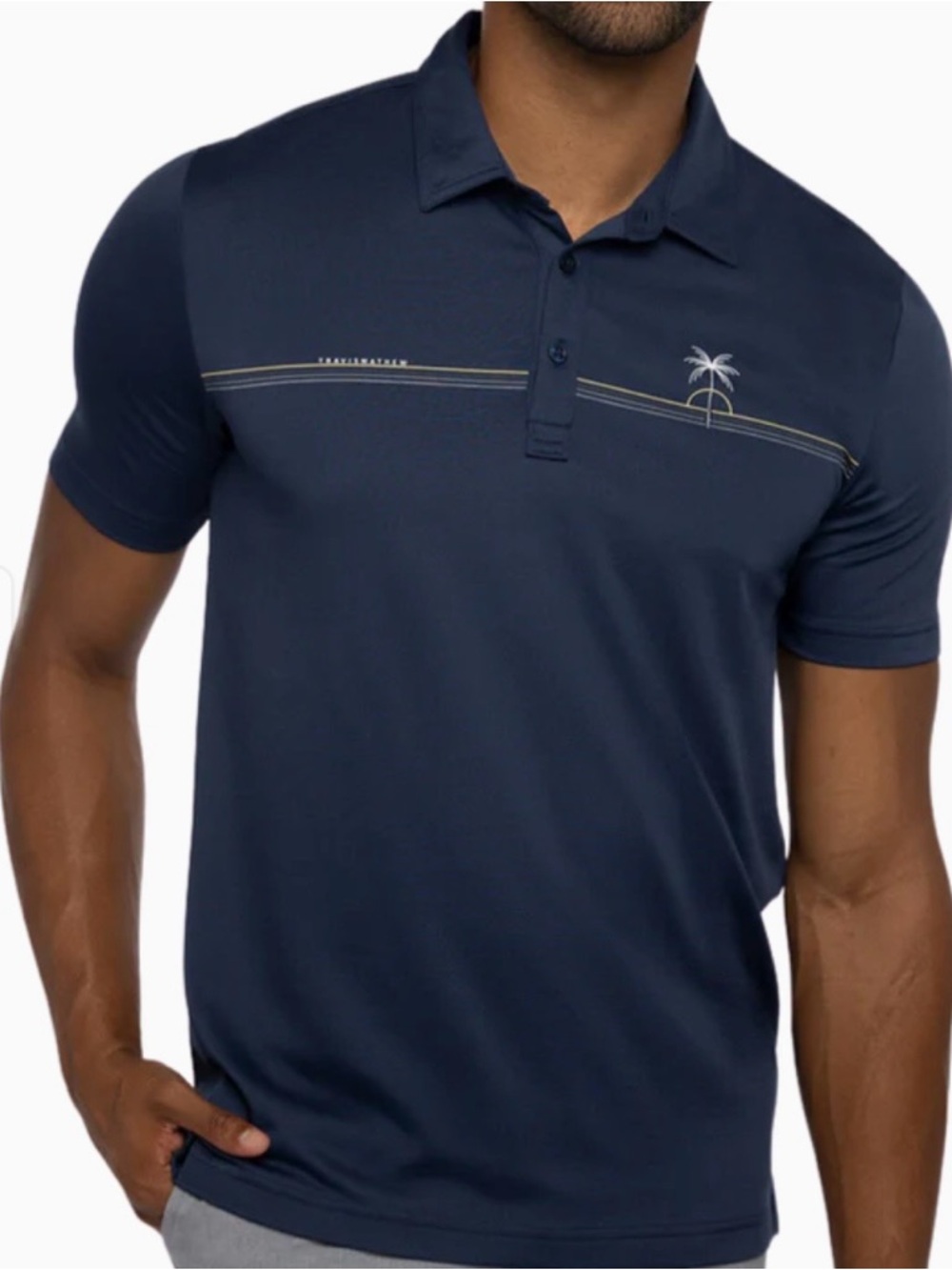 Travis Mathew Navy Polo with Thin Chest Stripe and Palm Motif